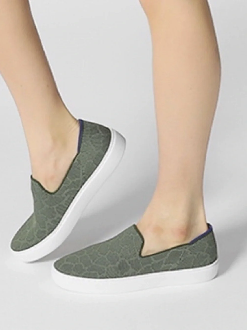 Rothy's Safari Green size 7 woman's Slip-On  sneakers with White Sole